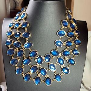 Beautiful blue and gold toned statement necklace.